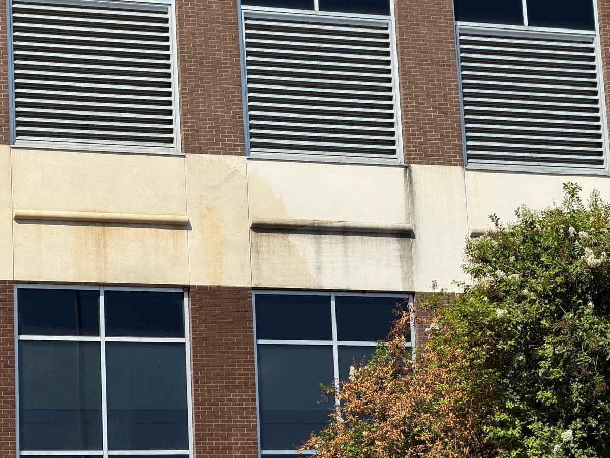Exterior wall and louvers showing the condition assessed for cleaning.